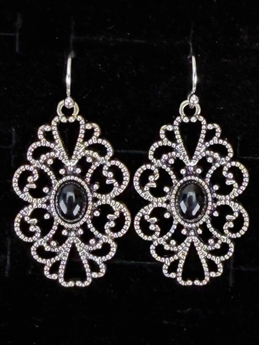 Beautiful Silvertone Black center bohemian pierced earrings